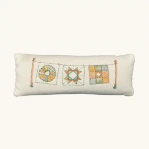 A completed sample of the Airing of the Quilts Pin Cushion by the Posy Collection