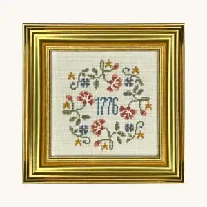Completed floral 1776 wreath counted cross stitch kit from the Posy Collection.