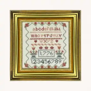 A complete Vintage 1776 Sampler counted cross stitch kit by the Posy Collection displayed in a frame.